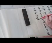Grandma Liu practicing calligraphy