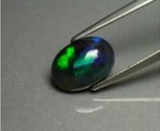 This is gemstone ID #368155 - Ethiopan Opal - Smoked Treatment. See full gemstone details at http://www.gemselect.com/opal/opal-368155.php.