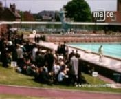 This home movie, shot by local film maker Fred Alvey, features the opening of Alfreton Lido by the Duke of Edinburgh on 15 May 1964.nnThis silent colour film begins with shots of the Lido’s distinctive light blue sign lettering and a close up of a poster on the wall which reads ‘A.D.A. Alfreton Development Association. £300 weekly in Prizes (Approximately). Come in and have a lucky dip. 1/-‘.nnWe then move to brief shots of High Street where Fred Alvey captures shots of a corner shop, A