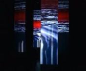 A doublesided videoprojection on six vertical strips of half transparent material at different depths in a blackbox space. nOne projection creates downward movement and the other a movement from side to side, thus creating a video weave on the projection surface where the projections overlap. nThe audio is generated by the changes in the video, one a dry chirping sound which pans with the horizontal movement of the video, the other is created by the downward movements of the other video, creatin