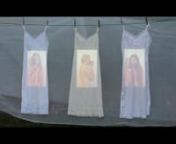 A video of three nude girls eating apples was projected onto three white dresses hanging from a clothesline. I wanted this piece to reference the biblical account of the