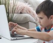 videoblocks-boy-e-learning-on-laptop-at-home_bpe2i9x_ce_1080__D from bpe