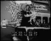 1946., USAnnNOTE:FOR ORDERING See:www.footagefarm.co.uk or contact us at:Info@Footagefarm.co.uknTitle.n03:11:42Miss America Queen of 1945, Bess Myerson, waving from parade float in Atlantic City, New Jersey; floats w/ various states candidates for Miss America 1946.MCUs.n03:12:03LS Contestants in swimsuit competition along runway:MCU Miss Arkansas, Miss West Virginia, Miss Alabama.Walking away.n03:12:21LS across crowd.Posing contestants.n03:12;31MS of finalists:Miss Arkan