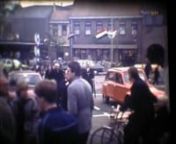 1982: fragment van de film van Dick Folmer over lok 94. We zien oa minister vd Broek en burgemeester Berger. Ze gaan naar de grote tent op het Europaplein. Harrie van Arensbergen voert het woord.