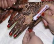 This videohighlights a traditionalFiji IndianMehendi andWeddingReception forMuzakkir andSanah over the 7th and 8th September 2012 .nnThe Mehendi (involving application of intricate henna patterns on the brides hands and feet) was a colourful,joyful event which we have captured in our video.nnThe wedding reception in the Serbian National Defence Council (SNDC)function hall in Canley Vale looked opulent with the classicred + gold theme matching the bride and groom attire of cours