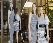 Kriti Sanon dressed up in body hugging black and white backless dress and sister Nupur Sanon fig out in black and white off shoulder dress for a dinner outing with friends at Gigi, Bandra.