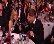 Kylie Minogue does a shoey with Roman Kemp at the Brit AwardsBrit Awards, ITV