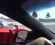 On a sunny highway, Camaro starts screwing around with a Enzo