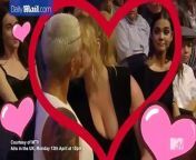 I&#39;m definitely half lesbian&#39;: Amy Schumer and Amber Rose have a steamy make-out session during MTV Movie Awards&#60;br/&#62;