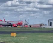Footage shows a plane making a bumpy landing due to Storm Kathleen – as flights are cancelled across the UK due to strong winds. &#60;br/&#62;&#60;br/&#62;The plane can be seen being buffeted about by strong winds as it comes in to land.&#60;br/&#62;&#60;br/&#62;The video, taken by Kay Thompson, 33, at Leeds Bradford Airport yesterday afternoon (Sat 6 April), shows the plane wobbling in crosswinds as it struggles to make it to the runway.&#60;br/&#62;&#60;br/&#62;Storm Kathleen has bought winds of up to 60mph across the UK, particularly across the West. &#60;br/&#62;&#60;br/&#62;Flights were left grounded and up to 34,000 people were left without power on Saturday due to the storm.&#60;br/&#62;&#60;br/&#62;Kay, from Leeds, said: “Obviously there were really strong winds, and I just noticed the planes were coming in sideways. &#60;br/&#62;&#60;br/&#62;“We usually go [to the airport] when it’s windy because we like to see if there’s going to be any go-arounds. &#60;br/&#62;&#60;br/&#62;“A go-around is basically where they almost touch down but can’t land safely so take off again – it only happens in really bad weather. &#60;br/&#62;&#60;br/&#62;“It’s the highest airport in the UK which is good for planes taking off but causes a lot of problems when it’s windy because it’s so high up.”