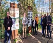 Stephen Cranford cuts the ribbon to open The Lost Railway Exhibition boards on the Downs Link
