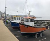 Summer is not far away as spectators watch as the iconic boats at Portstewart harbour are lifted into the sea.&#60;br/&#62;