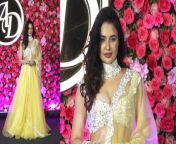 Yuvika Chaudhury, who recently garnered much attention due to her pregnancy rumours, was also spotted at Arti and Dipak’s sangeet ceremony. For the event, the actress opted for an elegant yellow organza lehenga-choli embroidered with resham, mirror and glass beads. Watch Video to know more... &#60;br/&#62; &#60;br/&#62;#ArtiSingh #ArtiSinghWedding #YuvikaChaudhary #sangeetceremony&#60;br/&#62;~PR.133~ED.141~