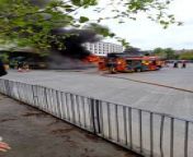 Bus engulfed in fire at Blackburn bus station, May 7, 2024 from bus in grab