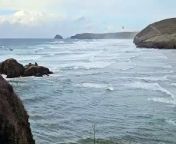 Dramatic footage shows the moment a dog walker was airlifted to safety - after falling into the sea.&#60;br/&#62;&#60;br/&#62;The man was walking along Cottys Point in Perranporth, Cornwall, when he was cut off by the tide on at around 4:30pm on Wednesday (March 27).&#60;br/&#62;&#60;br/&#62;Video taken by an onlooker shows the daring rescue mission in rough sea as an RNLI lifeboat first pulls him from the sea before he&#39;s winched up to a helicopter to safety.&#60;br/&#62;
