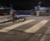 This guy lost control of his bike while speeding downhill on the street. He was going to take a turn on the road when he abruptly collided with the door ahead.