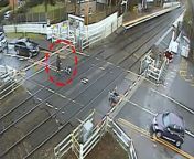 Heart-stopping footage shows the man ignore the flashing red lights and barge through barriers at Blakedown station in Worcestershire. Via SWNS.
