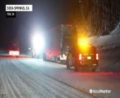 Road crews worked to remove snow in Soda Springs, California, on Feb. 20, as an atmospheric river continued to deliver heavy snow and rain to parts of the state.