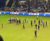 Wigan Athletic and Bolton Wanderers players get involved in a post-match scuffle after Latics&#39; 1-0 victory in their EFL League 1 clash at the DW Stadium
