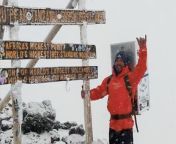 This man became the first person in the world to climb Mt. Kilimanjaro while carrying a fridge on his back. The man completed the grueling challenge to raise awareness about mental health issues.