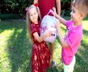 Diana and Roma argue who will get new toys and surprises. Dad helps children agree.